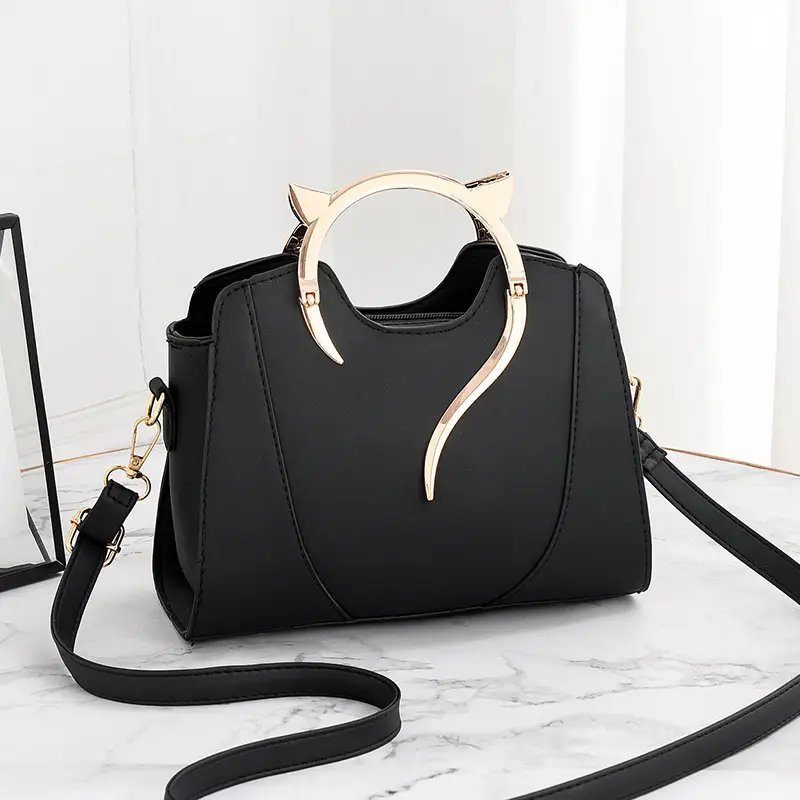 Gold metal griped handbag.